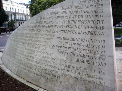 A massive inscription, the back wall to the 'Animals in War' memorial. Park Lane, London.