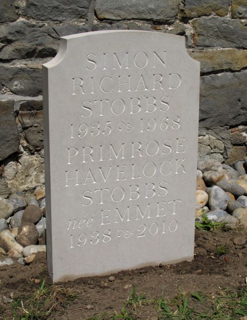 A Headstone in Purbeck 'Pond Free' Limestone. The lettering style is English Vernacular.